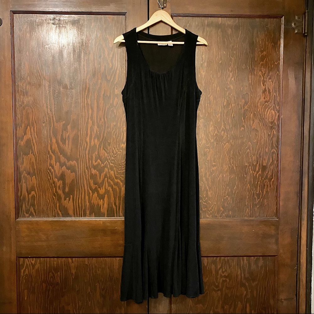 Swingy and slinky lightweight chicos travelers dress fits all frames.